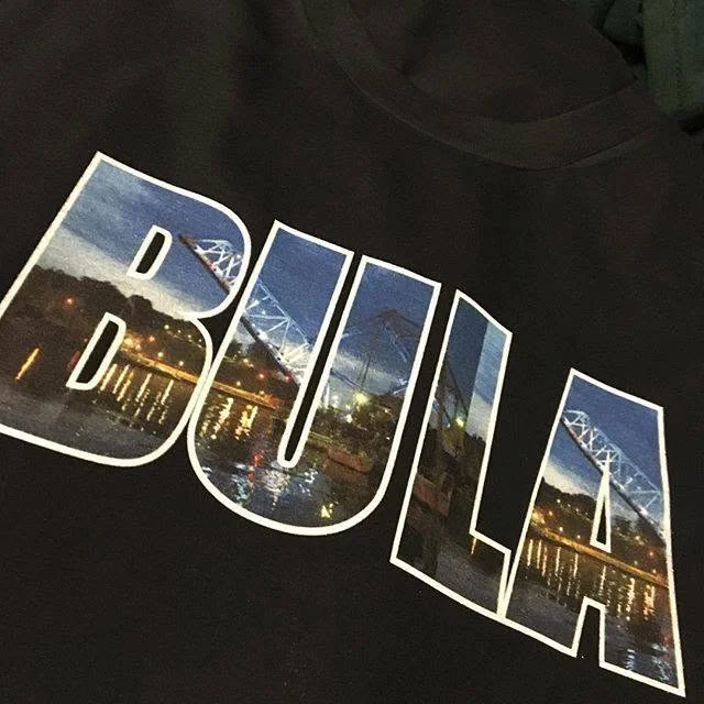 BULA shirt with waterfront photography inside the lettering