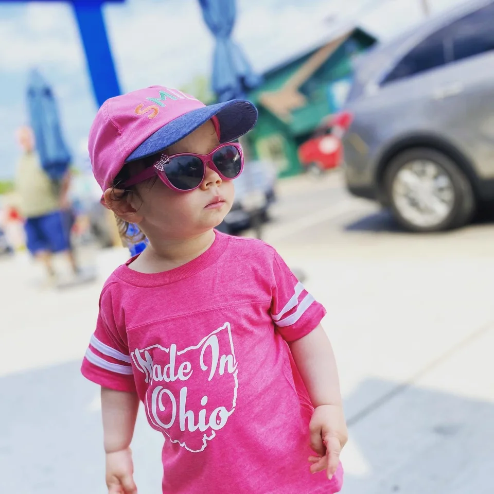 Child wearing a pink Made In Ohio shirt